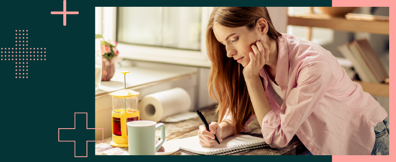 Woman writing in her notebook