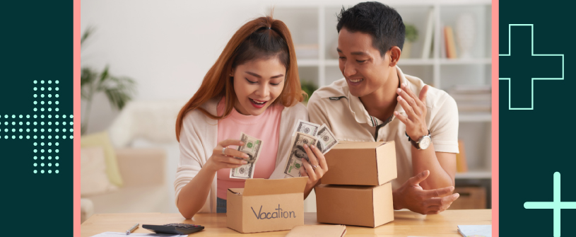 Two people counting out money from a box labeled 