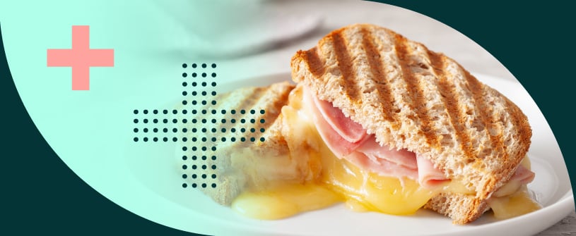 A grilled cheese sandwich on a plate.